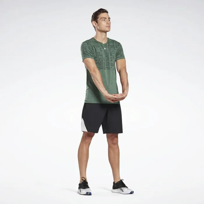 TShirts and Graphic Tees Mens Reebok LES MILLS Myoknit Seamless Tee Utility Green Black